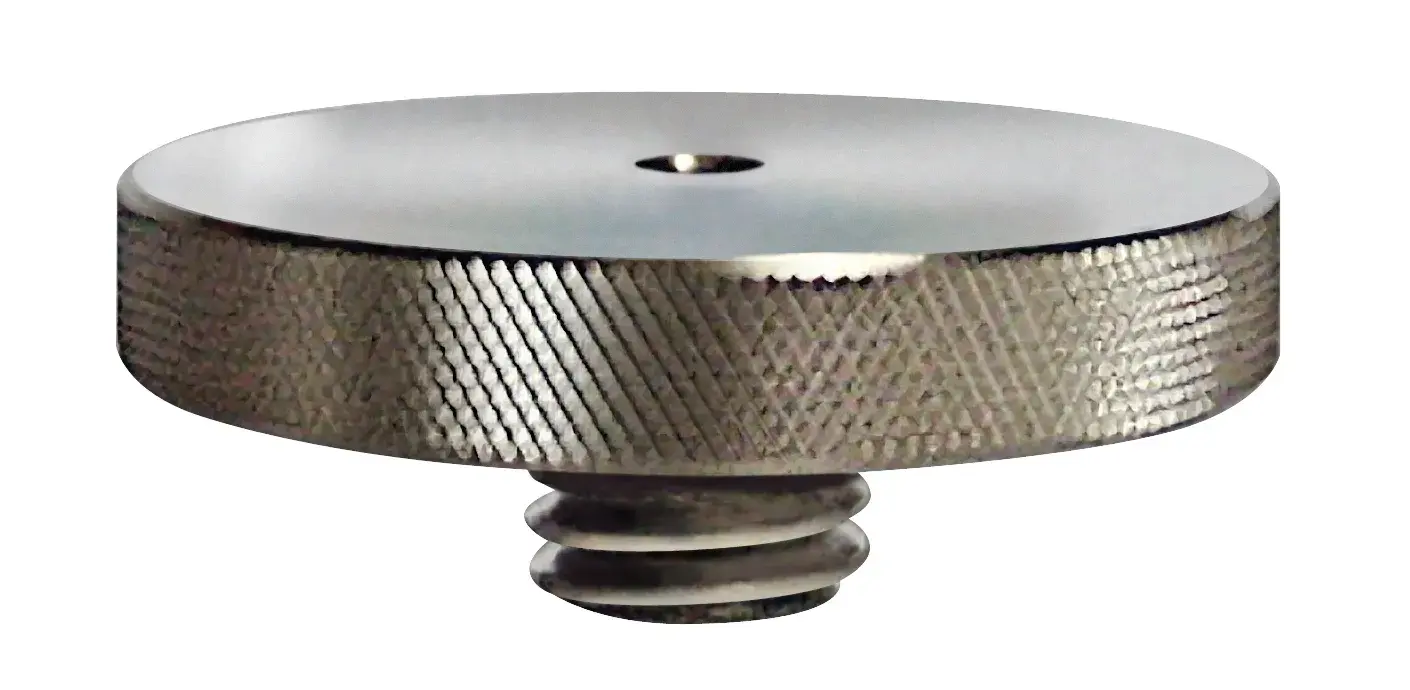 STANLEY 1-77-128 metal adapter disc with knurled edge, photography accessory, side angle on white background.