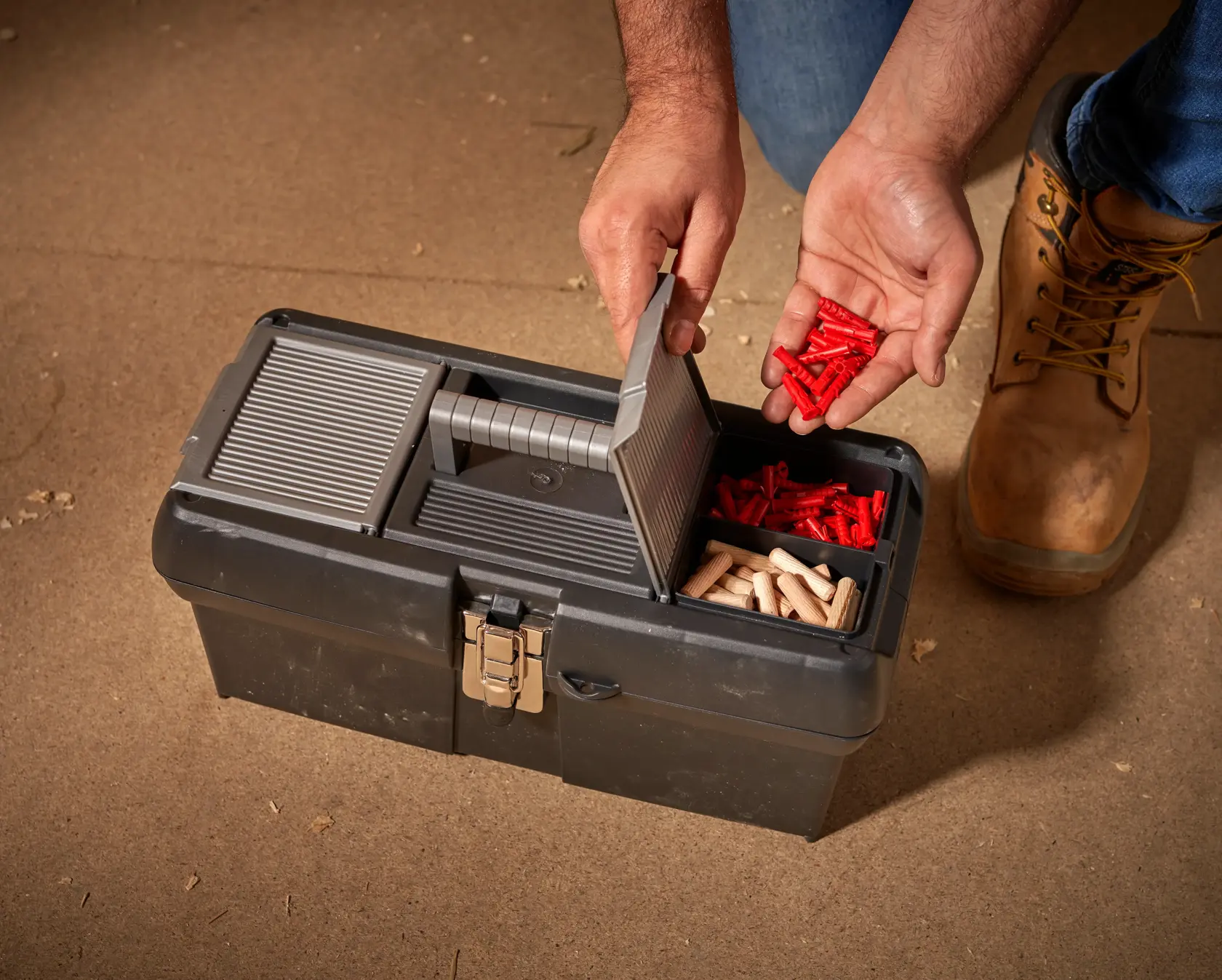 STANLEY 1-94-857 toolbox photo, top view with open lid showing red plugs and wooden dowels inside compartments.