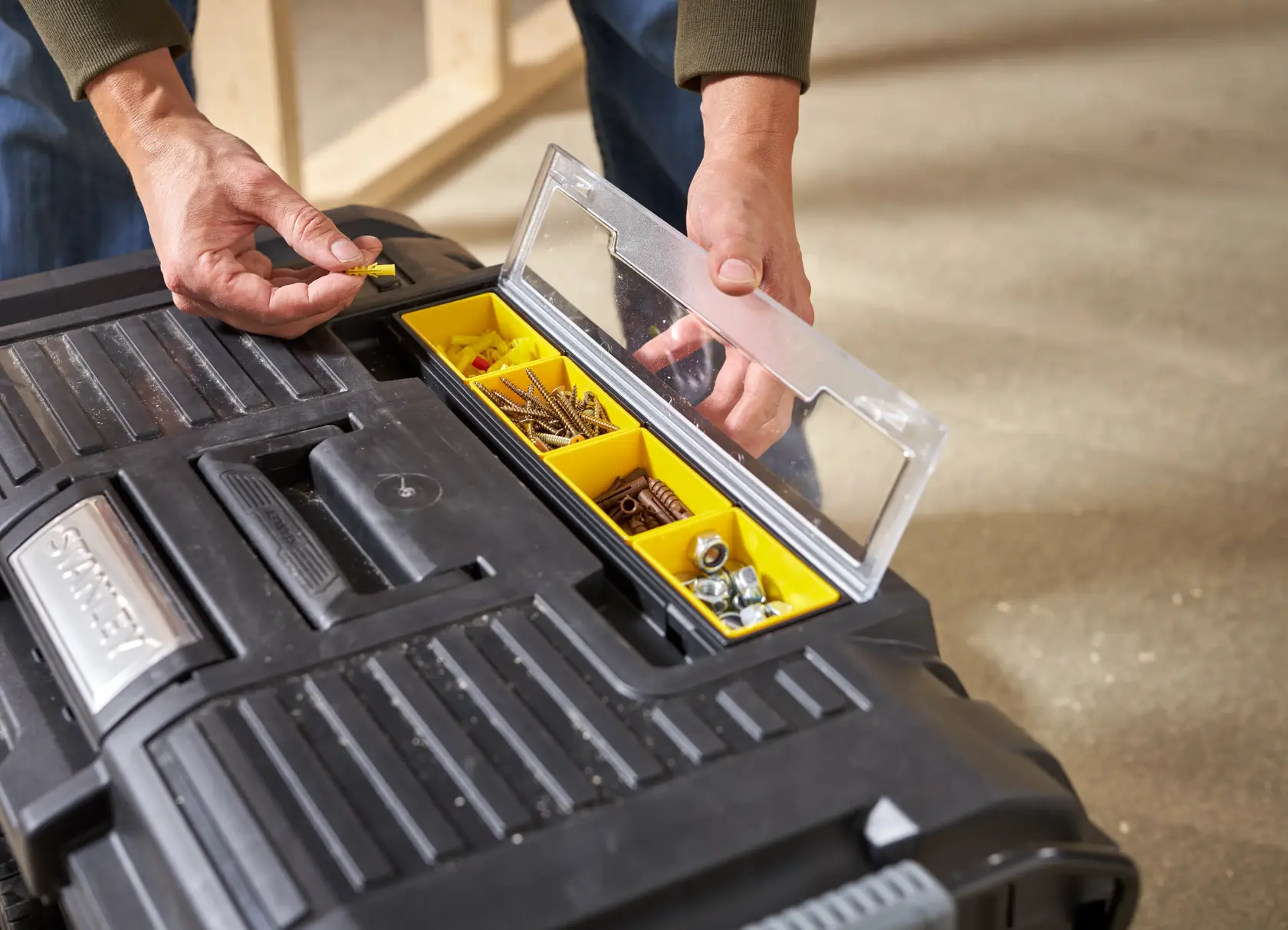 STANLEY STST1-70715 tool box photography, open compartment with yellow dividers and assorted hardware.